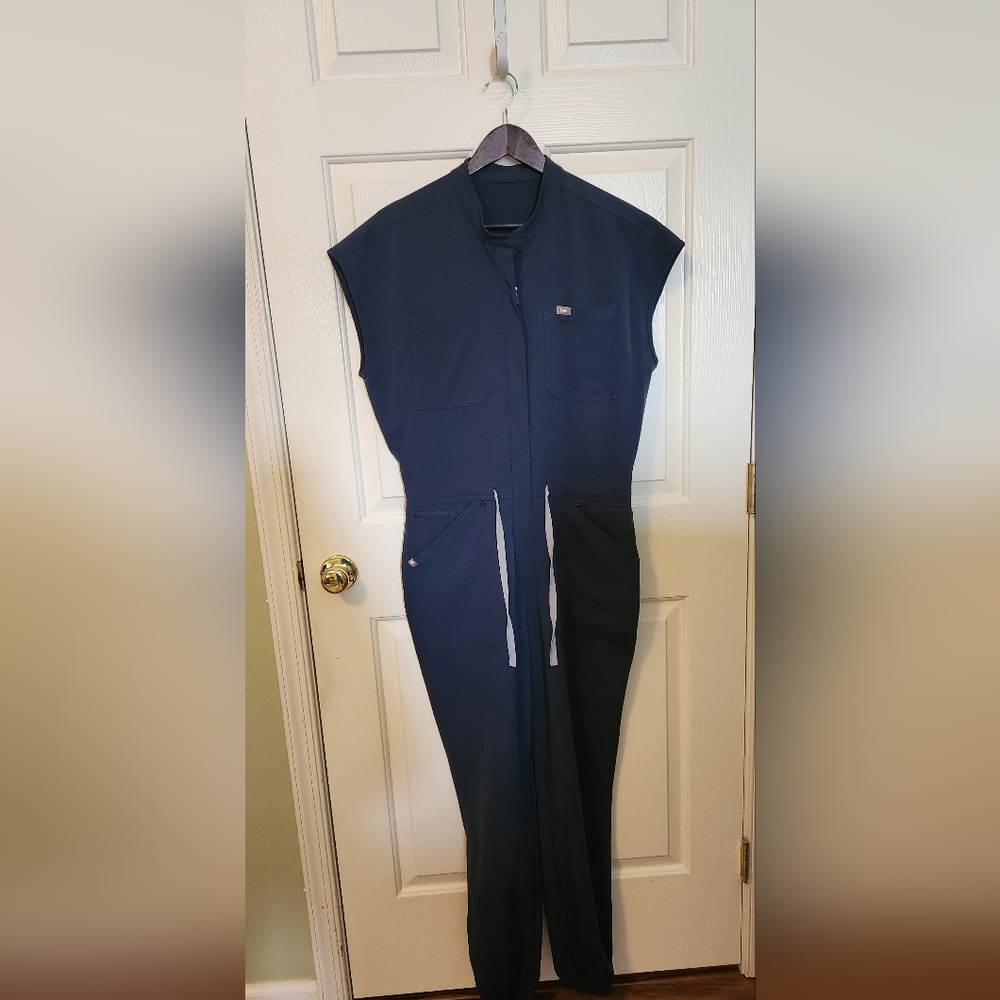 Figs Jumpsuit color dark harbor, a dark blue. Check with the website to compare.